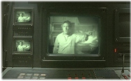 Dustin Hoffman on video monitors